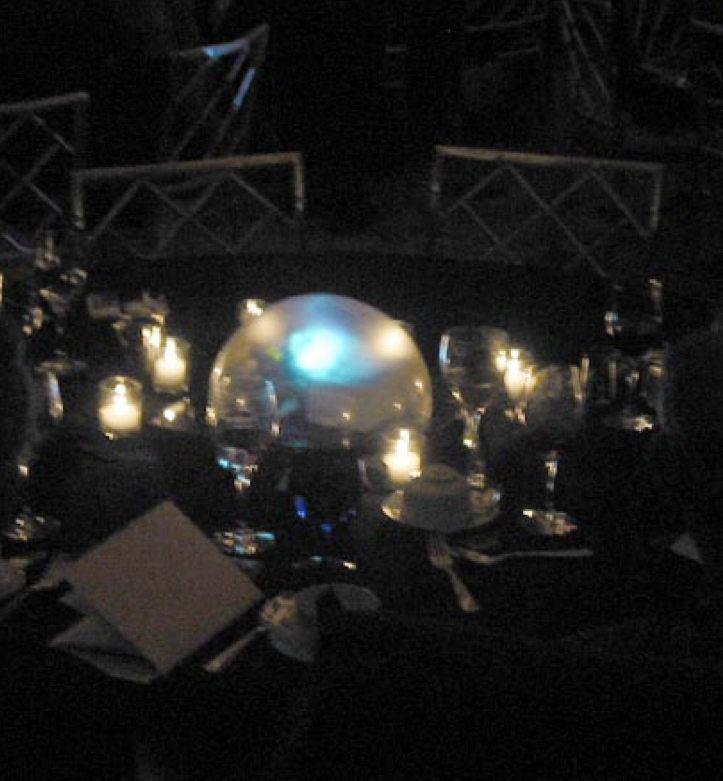 Photo of Eos Pods, a lighted dome in the center of a dining table